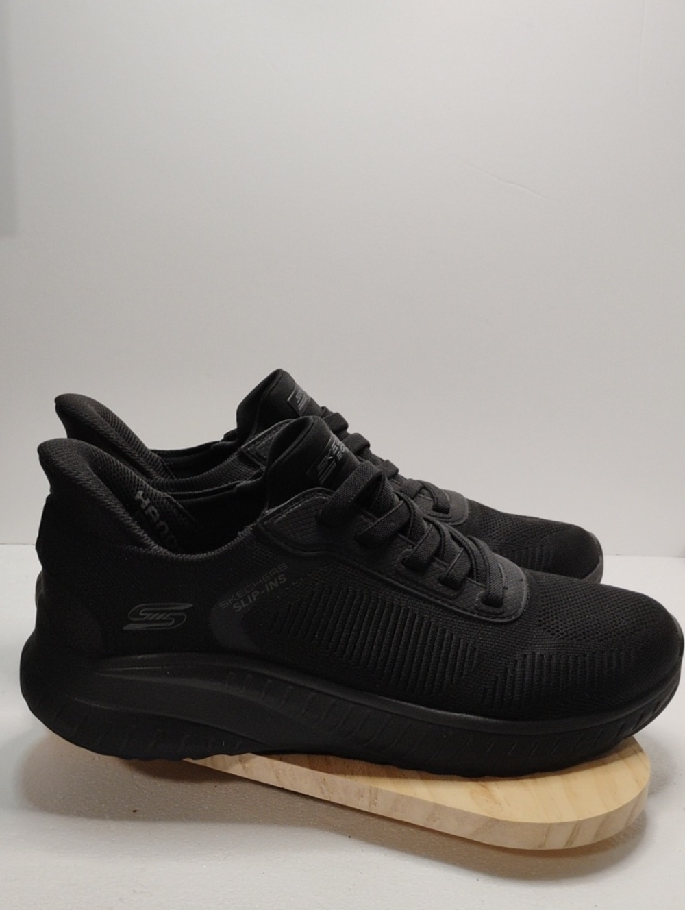 Skechers Men’s All-Black Knit Slip-On Athletic Sneakers